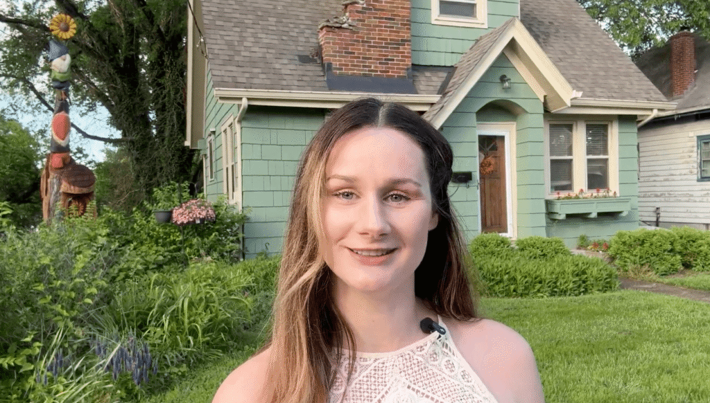 Sarah Rose Realtor in front of house in Cincinnati Ohio